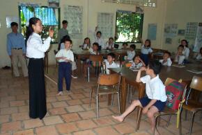 Teacher and deaf students in classroom